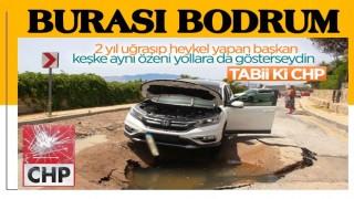 Bodrum'da asfalt yarıldı, cip içine düştü