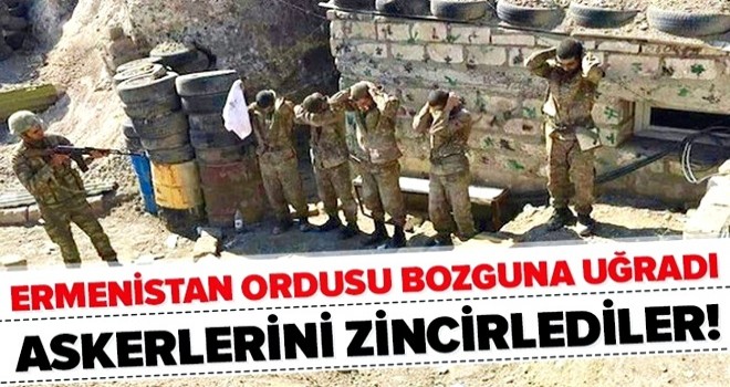 Bozguna uğrayan Ermenistan ordusu askerlerini mevzilere zincirliyor .